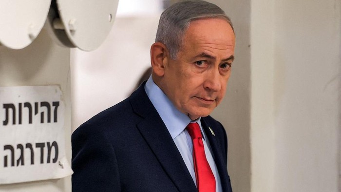 Israeli Prime Minister Benjamin Netanyahu arrives for a press conference in Jerusalem on March 19, 2026. Netanyahu said on March 19 that Israel and the US were winning the war against Iran, with the Islamic republic decimated and unable to enrich