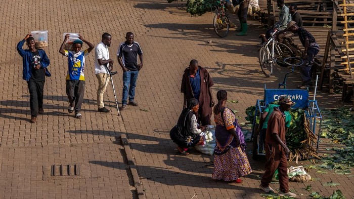 Traders wait for clearance at the border crossing point in Gisenyi, as Rwanda tightens health screening following an Ebola outbreak caused by the Bundibugyo virus in DR Congo, Rubavu district, Rwanda, May 18, 2026. REUTERS/Jean Bizimana