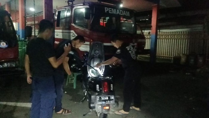 Ular dalam jok motor di Kuningan
