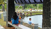 Sejumlah warga beraktivitas di kawasan Embung Pemuda, Jakarta Selatan, Kamis (21/5/2026). 