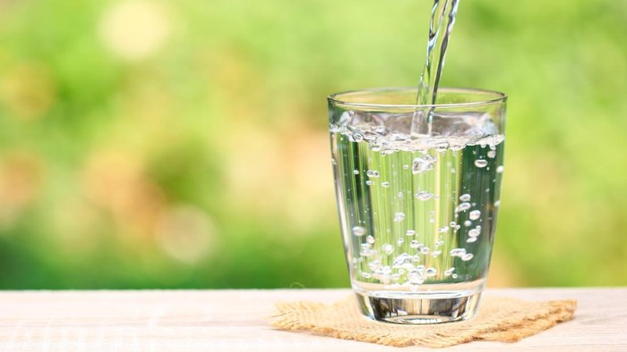 Closeup Glass of water on table nature background