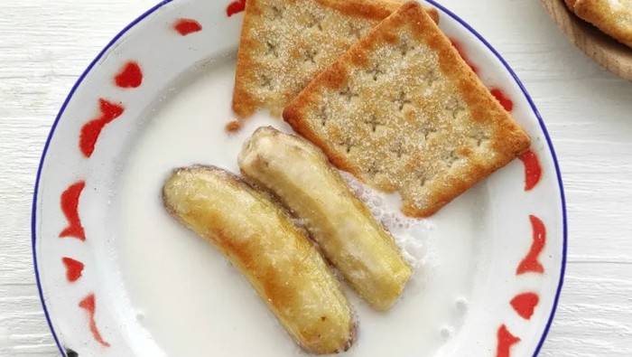 Pisang panggang kuah santan khas Bukittinggi. (dok Cookpad @azizarahmi).