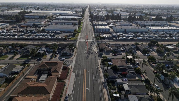 A drone photo shows a blocked-off road as a chemical incident involving a failing tank of flammable liquid called methyl methacrylate, used in the aerospace industry, has forced an evacuation in the surrounding area in Garden Grove, California, U.S. May, 22, 2026.   REUTERS/ Caroline Brehman