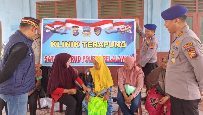 πrogram JALUR Polda Riau turun ke pelosok desa di Pelalawan salurkan bantuan ke masyarakat, Minggu (24/5/2026).