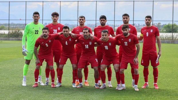 Iran's national football team's players pose on the pitch before a friendly match between Iran and Costa Rica, in Antalya, southern Turkey, on March 31, 2026. FIFA's president told AFP that Iran 