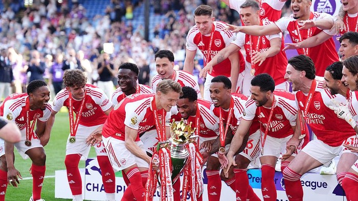 Arsenals Martin Odegaard lifts the Premier League trophy after the Premier League match at Selhurst Park, London. Picture date: Sunday May 24, 2026. (Photo by John Walton/PA Images via Getty Images)