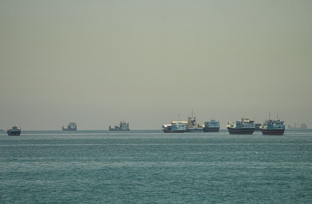 IRAN-CRISIS/OMAN-HORMUZ Vessels anchored at the Strait of Hormuz, as seen from Musandam, Oman, May 25, 2026. REUTERS/Stringer REFILE - CORRECTING INFORMATION FROM