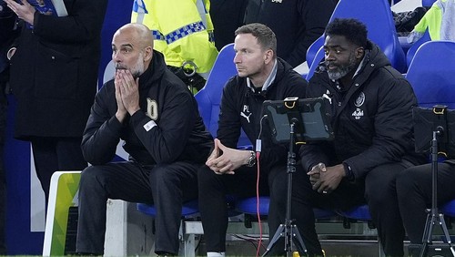 Manchester City manager Pep Guardiola (left), assistant managers Kolo Toure and Pepijn Lijnders (centre) react in the dugouts during the Premier League match at Hill Dickinson Stadium, Liverpool. Picture date: Monday May 4, 2026. (Photo by Peter Byrne/PA Images via Getty Images)