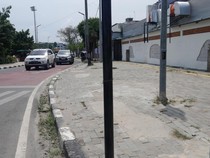 Trotoar Terkelupas -Lubang Mengaga di Jalan Kejaksaan Medan Diperbaiki