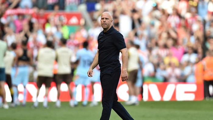 FILE PHOTO: Soccer Football - Premier League - Liverpool v Brentford - Anfield, Liverpool, Britain - May 24, 2026 Liverpool manager Arne Slot reacts after the match REUTERS/Peter Powell/File Photo EDITORIAL USE ONLY. NO USE WITH UNAUTHORIZED AUDIO, VIDEO, DATA, FIXTURE LISTS, CLUB/LEAGUE LOGOS OR LIVE SERVICES. ONLINE IN-MATCH USE LIMITED TO 120 IMAGES, NO VIDEO EMULATION. NO USE IN BETTING, GAMES OR SINGLE CLUB/LEAGUE/PLAYER PUBLICATIONS. PLEASE CONTACT YOUR ACCOUNT REPRESENTATIVE FOR FURTHER DETAILS..