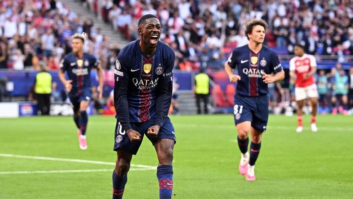 Soccer Football - UEFA Champions League - Final - Paris St Germain v Arsenal - Puskas Arena, Budapest, Hungary - May 30, 2026 Paris St Germains Ousmane Dembele celebrates scoring their first goal REUTERS/Angelika Warmuth