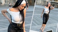 Denada memakai atasan putih dengan bando berwarna senada saat difoto Aisha Aurum. (Foto: dok Instagram denadaindonesia)