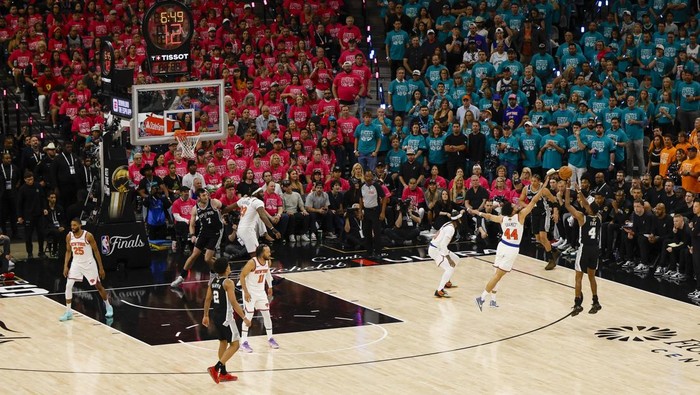 Jun 3, 2026; San Antonio, Texas, USA; San Antonio Spurs guard De'aaron Fox (4) makes a jump shot over New York Knicks guard Landry Shamet (44) during the second quarter during game one of the 2026 NBA Finals at Frost Bank Center. Mandatory Credit: Geoff Burke-Imagn Images
