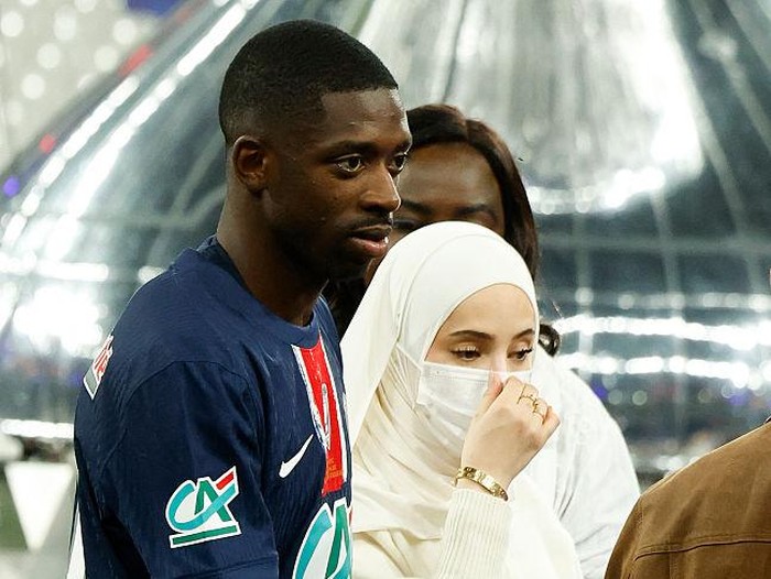 PARIS, FRANCE - MAY 17: Ousmane Dembele of PSG and his wife Rima Edbouche celebrate during the Ligue 1 trophy ceremony following the Ligue 1 football match between Paris Saint-Germain (PSG) and  AJ Auxerre (AJA) at Parc des Princes stadium on May 17, 2025 in Paris, France. (Photo by Jean Catuffe/Getty Images)