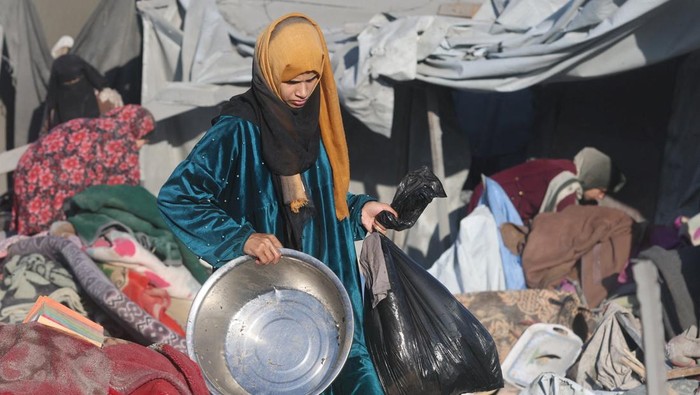 Warga Gaza (Foto: REUTERS/Ramadan Abed)