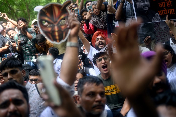 Cockroach Janta Party (CJP) supporters shout slogans during a protest over alleged irregularities in the countrys major examinations, in New Delhi on June 6, 2026. Hundreds of young students gathered in New Delhi on June 6 for the first street protest by the satirical 