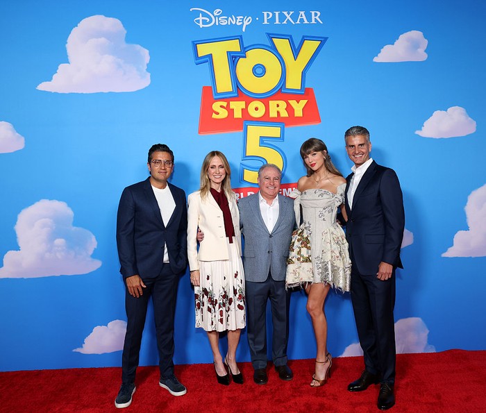 LOS ANGELES, CALIFORNIA - JUNE 09: (EDITORIAL USE ONLY. NO STANDALONE PUBLICATION USE. NO SPECIAL INTEREST OR SINGLE ARTIST PUBLICATION USE; NO BOOK USE) (L-R) Asad Ayaz, Chief Marketing and Brand Officer, The Walt Disney Company, Dana Walden, President and Chief Creative Officer, The Walt Disney Company, Alan Bergman, Chairman, Disney Entertainment, Taylor Swift and Josh D'Amaro, Chief Executive Officer, The Walt Disney Company, attend the Toy Story 5 Los Angeles World Premiere at Dolby Theatre in Los Angeles, California on June 09, 2026. (Photo by Kevin Mazur/Getty Images for for TAS Rights Management)