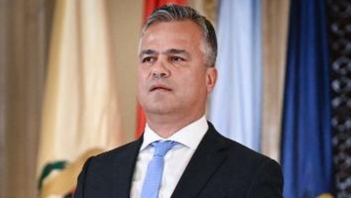 Picture taken on June 15, 2023 shows then Minister of Development, Public Works, and Administration Adrian Vestea, during the swearing-in ceremony at the Cotroceni Palace in Bucharest. Romanian President Nicusor Dan nominated the 52-year-old liberal 