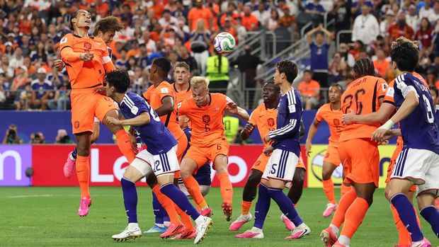 ARLINGTON, TEXAS - JUNE 14: Koki Ogawa #19 of Japan scores his team's second goal during the FIFA World Cup 2026 Group F match between Netherlands and Japan at Dallas Stadium on June 14, 2026 in Arlington, Texas. (Photo by Alex Pantling - FIFA/FIFA via Getty Images)