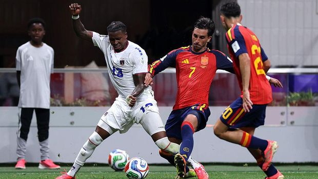 ATLANTA, GEORGIA - JUNE 15: Sidny Lopes Cabral #13 of Cabo Verde is challenged by Ferran Torres #7 of Spain during the FIFA World Cup 2026 Group H match between Spain and Cabo Verde at Atlanta Stadium on June 15, 2026 in Atlanta, Georgia. (Photo by Mattia Ozbot/Getty Images)