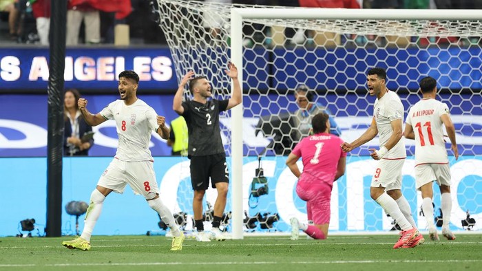 LOS ANGELES, CALIFORNIA - JUNE 15: Mohammad Mohebbi #8 of IR Iran celebrates scoring his teams second goal during the FIFA World Cup 2026 Group G match between IR Iran and New Zealand at Los Angeles Stadium on June 15, 2026 in Los Angeles, California. (Photo by Matt McNulty - FIFA/FIFA via Getty Images)