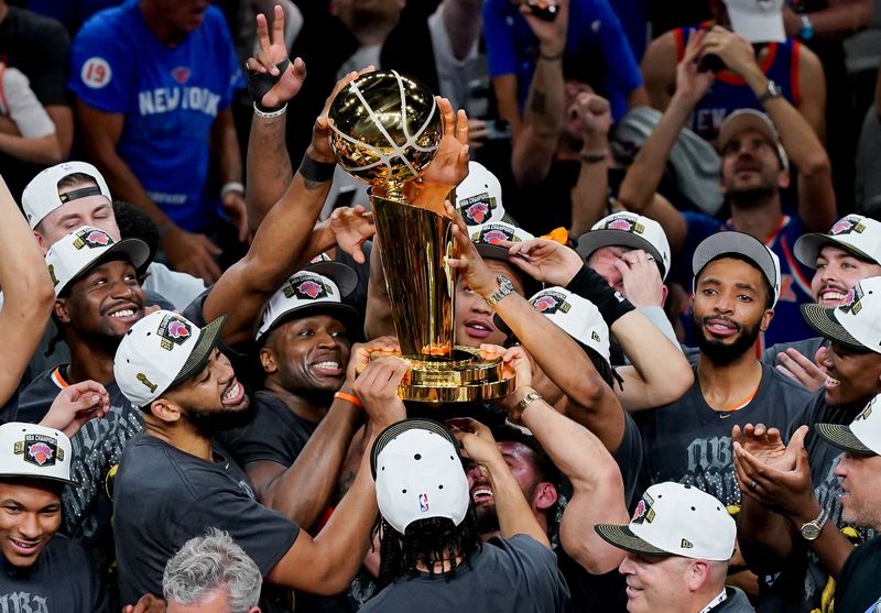 San Antonio Spurs, New York Knicks Jun 13, 2026; San Antonio, Texas, USA; The New York Knicks hoist the trophy after defeating the San Antonio Spurs in game five of the 2026 NBA Finals to win the 2026 NBA Championship at Frost Bank Center. Mandatory Credit: Dustin Safranek-Imagn Images TPX IMAGES OF THE DAY