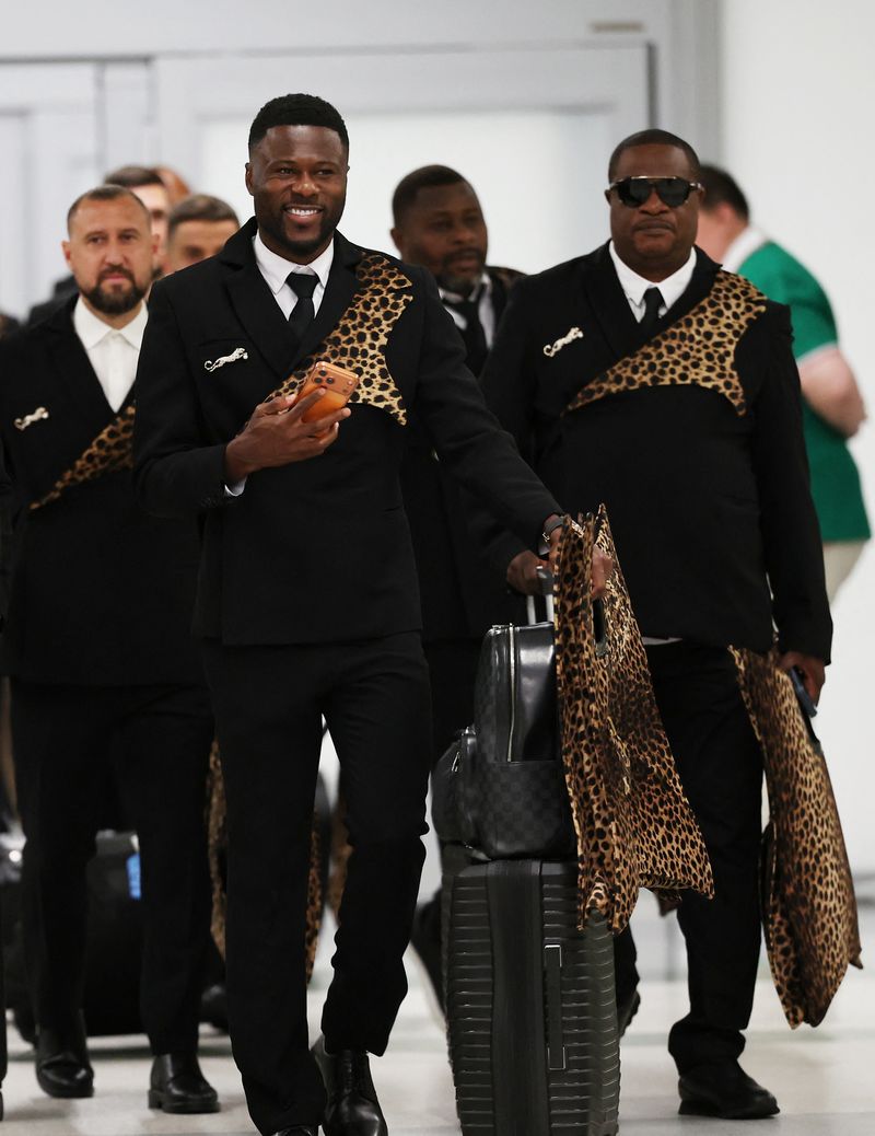 Soccer Football - FIFA World Cup 2026 - DR Congo Arrive in Houston - George Bush Intercontinental Airport, Houston, Texas, U.S. - June 11, 2026 A DR Congo official arrives at the airport in Houston ahead of the FIFA World Cup IMAGN IMAGES via Reuters/Troy Taormina