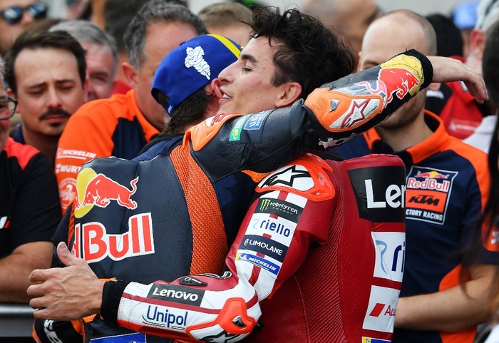 Second placed Team Red Bull KTM Factory Racings Pedro Acosta (L) and winner Team Ducati Lenovo Teams Marc Marquez (R) hug after the Hungarian Motorcycle MotoGP Grand Prix at the Balaton Park circuit in Balatonfokajar, Hungary, on June 7, 2026. (Pho