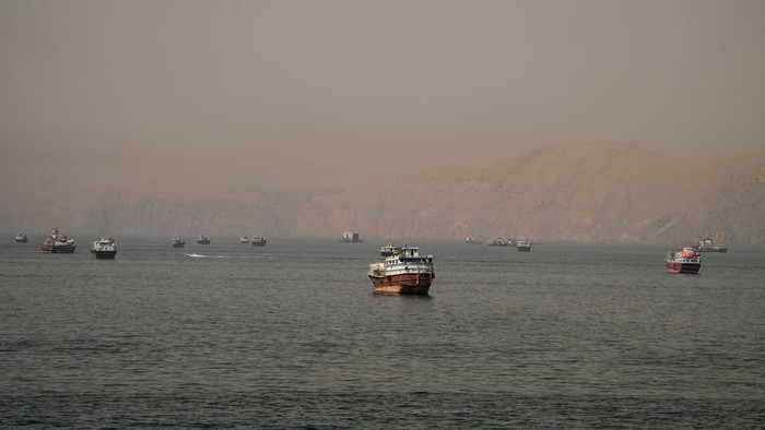 Vessels at the Strait of Hormuz, as seen from Musandam, Oman, June 18, 2026. REUTERS/Stringer