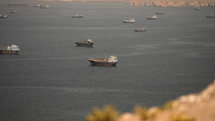 Vessels at the Strait of Hormuz, as seen from Musandam, Oman, June 18, 2026. REUTERS/Stringer