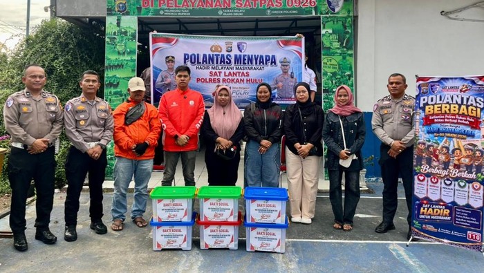 Polantas menyapa warga di Riau, bagikan bansos dan bedah rumah jelang HUT Bhayangkara ke-80, Kamis (18/6/2026).