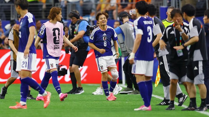 Soccer Football - FIFA World Cup 2026 - Group F - Netherlands v Japan - Dallas Stadium, Arlington, Texas, U.S. - June 14, 2026 Japans Takefusa Kubo celebrates their second goal, scored by Daichi Kamada REUTERS/Issei Kato