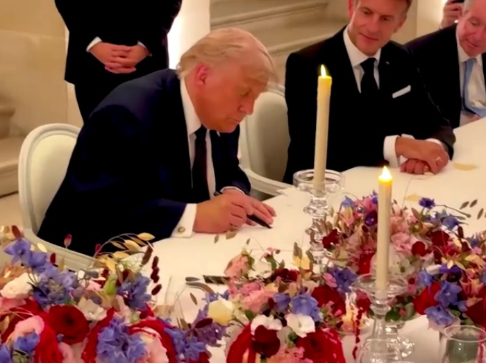 President Donald Trump signed the Iran Memorandum of Understanding at the Palace of Versailles on Wednesday (June 17), just prior to a dinner hosted by French President Emmanuel Macron.