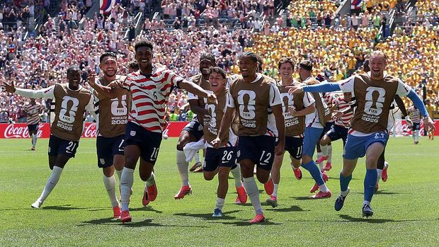 SEATTLE, WASHINGTON - JUNE 19: Alex Freeman #16 of the United States celebrates with teammates after scoring his team's second goal during the FIFA World Cup 2026 Group D match between USA and Australia at Seattle Stadium on June 19, 2026 in Seattle, Washington. (Photo by Jamie Squire/Getty Images)