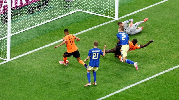 Belanda vs Swedia Soccer Football - FIFA World Cup 2026 - Group F - Netherlands v Sweden - Houston Stadium, Houston, Texas, U.S. - June 20, 2026 Netherlands' Cody Gakpo scores their third goal REUTERS/Pedro Nunes