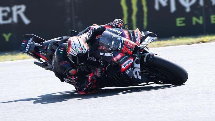 BRNO, CZECH REPUBLIC - JUNE 20: Marco Bezzecchi of Italy and Aprilia Racing rounds the bend during the MotoGP practice during the Sprint/qualifying ahead of the MotoGP of  Czechia at Brno Circuit on June 20, 2026 in Brno, Czech Republic. (Photo by Mi