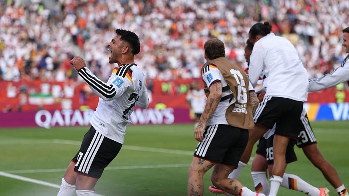 20 June 2026, Canada, Toronto: Soccer, Men, 2026 World Cup, Germany vs. Ivory Coast, Group Stage, Group E, Matchday 2, Toronto Stadium, Deniz Undav (Germany) celebrates his goal to make it 2-1 with his teammates. PLEASE NOTE: In accordance with FIFA regulations, these images may be used exclusively for editorial purposes. Commercial use is prohibited. Furthermore, no video-like sequences may be created, and no alterations may be made to the image, either in the foreground or the background. Photo: Jan Woitas/dpa (Photo by Jan Woitas/picture alliance via Getty Images)