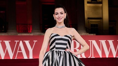 9 Cara Anne Hathaway Sembunyikan Kehamilan di Red Carpet dengan Busana