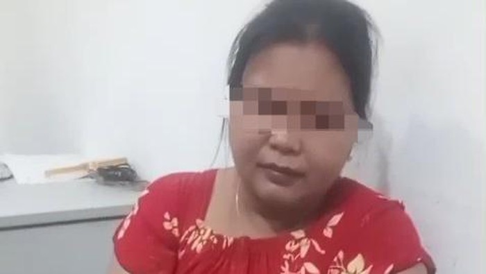 Keterangan Foto: -Ibu tiri penganiaya anak 9 tahun di Batam ditetapkan tersangka.(Dok Polsek Sagulung)