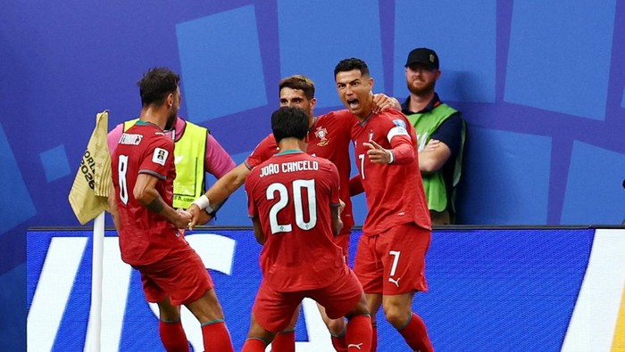 Soccer Football - FIFA World Cup 2026 - Group K - Portugal v Uzbekistan - Houston Stadium, Houston, Texas, U.S. - June 23, 2026 Portugals Cristiano Ronaldo celebrates scoring their third goal with Joao Cancelo, Bruno Fernandes and Pedro Neto REUTERS/Phil Noble