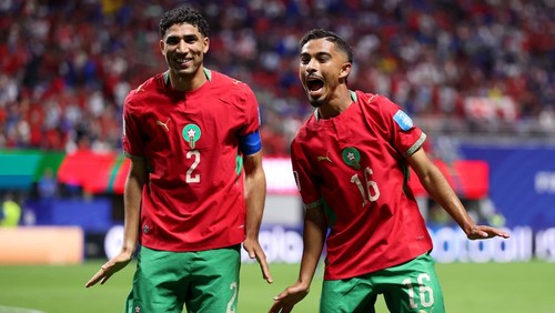 ATLANTA, GEORGIA - JUNE 24: Gessime Yassine #16 of Morocco  celebrates with teammate Achraf Hakimi #2 after scoring his teams fourth goal during the FIFA World Cup 2026 Group C match between Morocco and Haiti at Atlanta Stadium on June 24, 2026 in Atlanta, Georgia. (Photo by Kevin C. Cox/Getty Images)