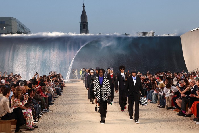 Models present creations by designer and musician Pharrell Williams as part of his Menswear Spring-Summer 2027 collection show for fashion house Louis Vuitton during Mens Fashion Week in Paris, France, June 23, 2026. REUTERS/Gonzalo Fuentes      TPX IMAGES OF THE DAY