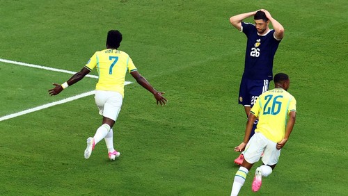 Soccer Football - FIFA World Cup 2026 - Group C - Scotland v Brazil - Miami Stadium, Miami Gardens, Florida, U.S. - June 24, 2026 Brazils Vinicius Junior celebrates scoring their first goal as Scotlands Scott McKenna looks dejected REUTERS/Marco Bello