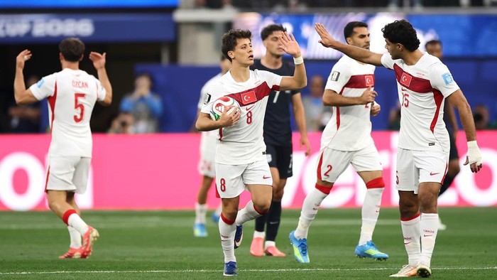 INGLEWOOD, CALIFORNIA - JUNE 25: Arda Guler #8 of Turkiye celebrates with teammates after scoring his teams first goal during the FIFA World Cup 2026 Group D match between Türkiye and USA at Los Angeles Stadium on June 25, 2026 in Inglewood, California. (Photo by Alex Grimm/Getty Images)