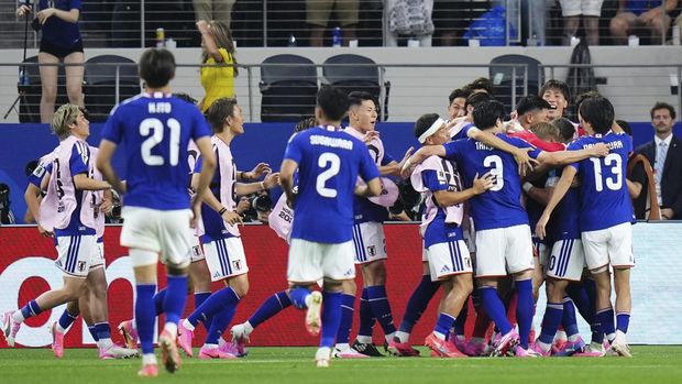 Daizen Maeda of Japan celebrates after scoring his team's first goal with teammates during the FIFA World Cup 2026 Group F match between Japan and Sweden at Dallas Stadium on June 25, 2026 in Dallas, United States. (Photo by Jose Breton/Pics Action/NurPhoto via Getty Images)