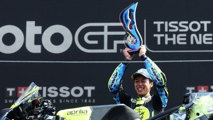 MotoGP - Grand Prix of Netherlands - TT Circuit Assen, Assen, Netherlands - June 28, 2026 Trackhouse MotoGP Teams Ai Ogura celebrates on the podium with a trophy after winning the MotoGP race REUTERS/Omar Havana