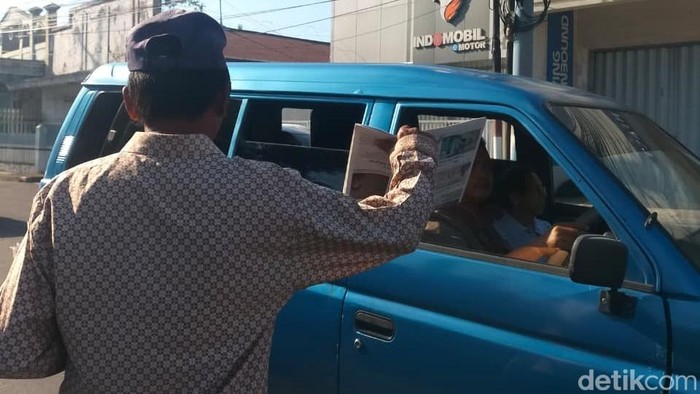 Loper koran di Jember.