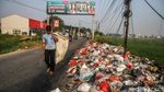 Tumpukan Sampah Liar Meluber ke Jalan, Ganggu Pengendara