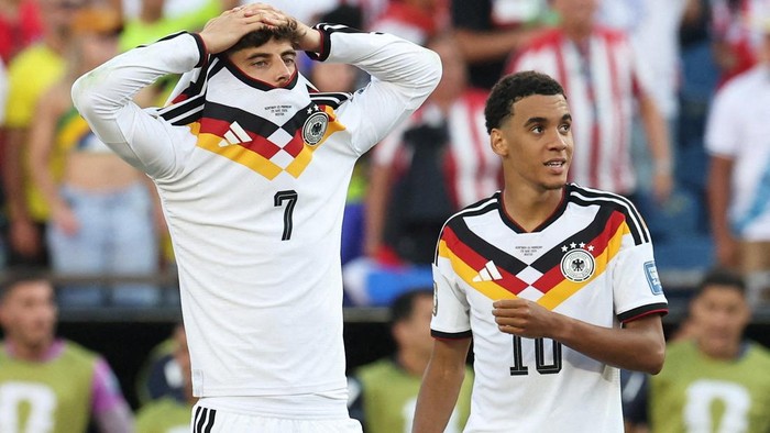 Soccer Football - FIFA World Cup 2026 - Round of 32 - Germany v Paraguay - Boston Stadium, Foxborough, Massachusetts, U.S. - June 29, 2026 Germanys Kai Havertz and Jamal Musiala react during the penalty shootout REUTERS/Amanda Perobelli     TPX IMAGES OF THE DAY