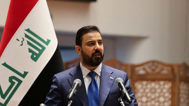Perdana Menteri Irak terpilih Ali al-Zaidi berbicara selama sesi parlemen untuk memilih pemerintahan baru yang dipimpin oleh Ali al-Zaidi sebagai perdana menteri, di markas parlemen di Baghdad, Irak, 14 Mei 2026. (REUTERS/Ahmed Saad)